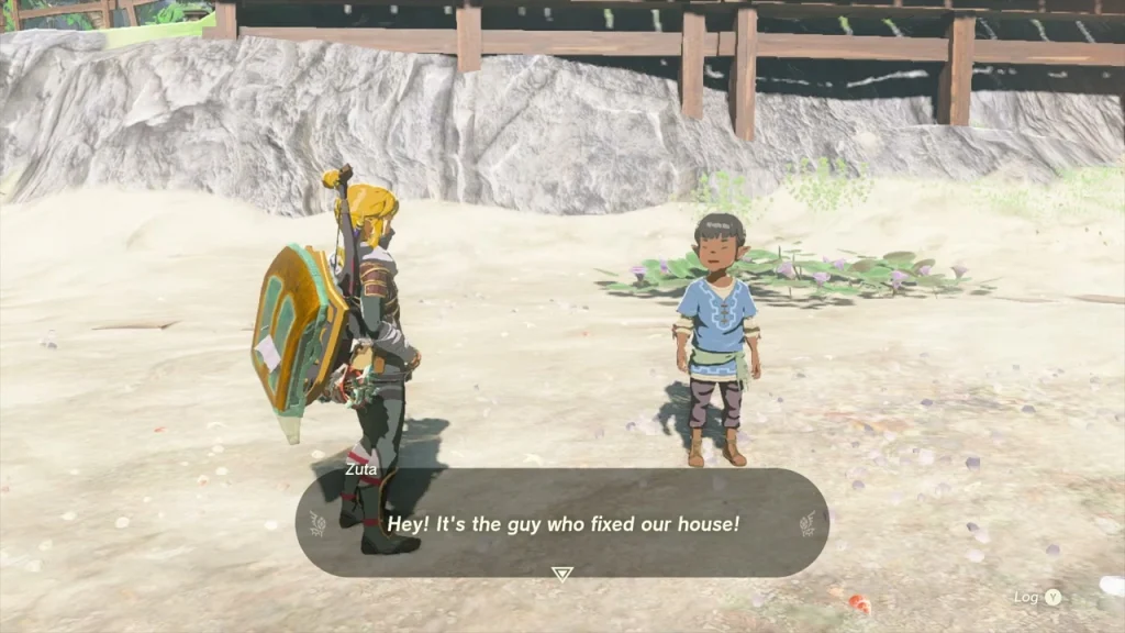 Zuta standing on Lurelin beach with his sister Zuta standing on Lurelin beach with his sister