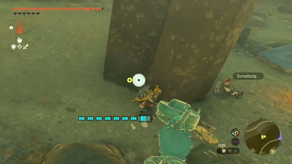 Lost traveler sitting against a rock pillar in the canyon