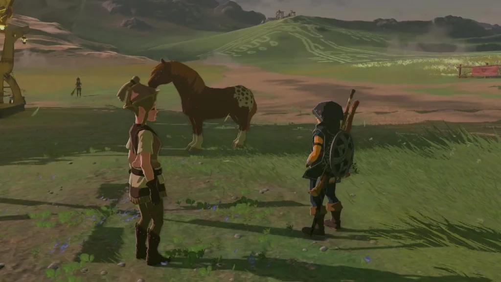 Zumi standing beside the caught horse in the field before hitching it up Zumi standing beside the caught horse in the field before hitching it up