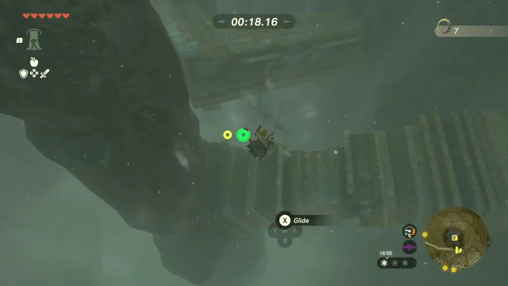 Green rings wrapped around the central pillar with the course timer above