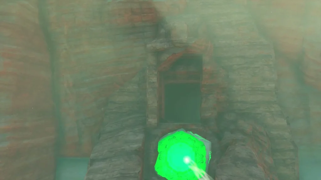 Light beam striking the glowing green receptor on the statue