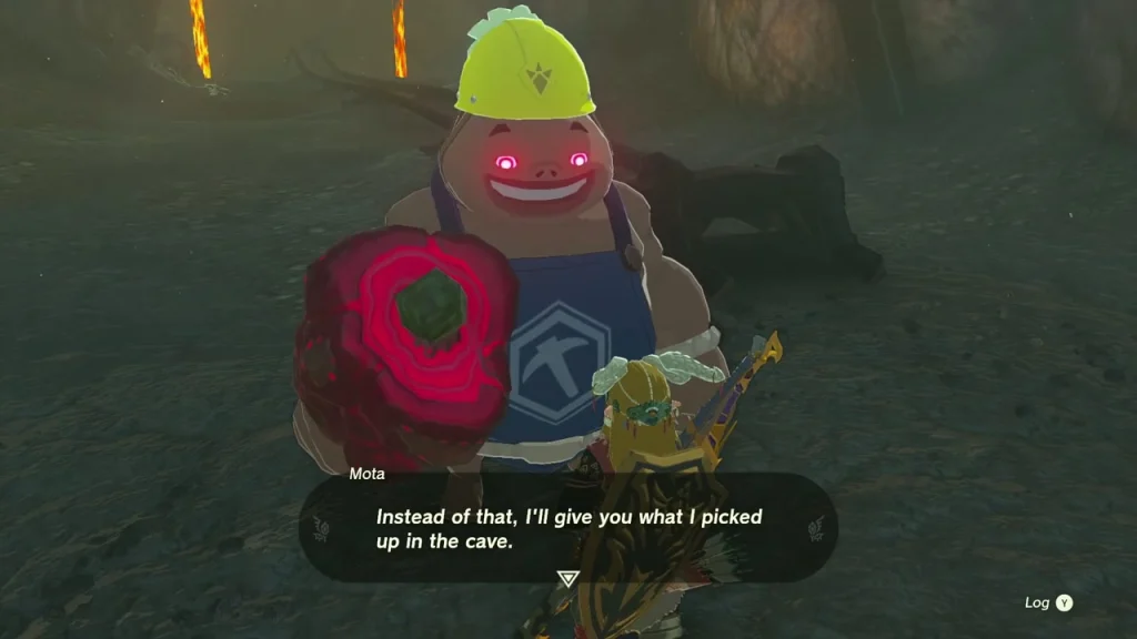 Mota holding a glowing red rock out as a gift Mota holding a glowing red rock out as a gift