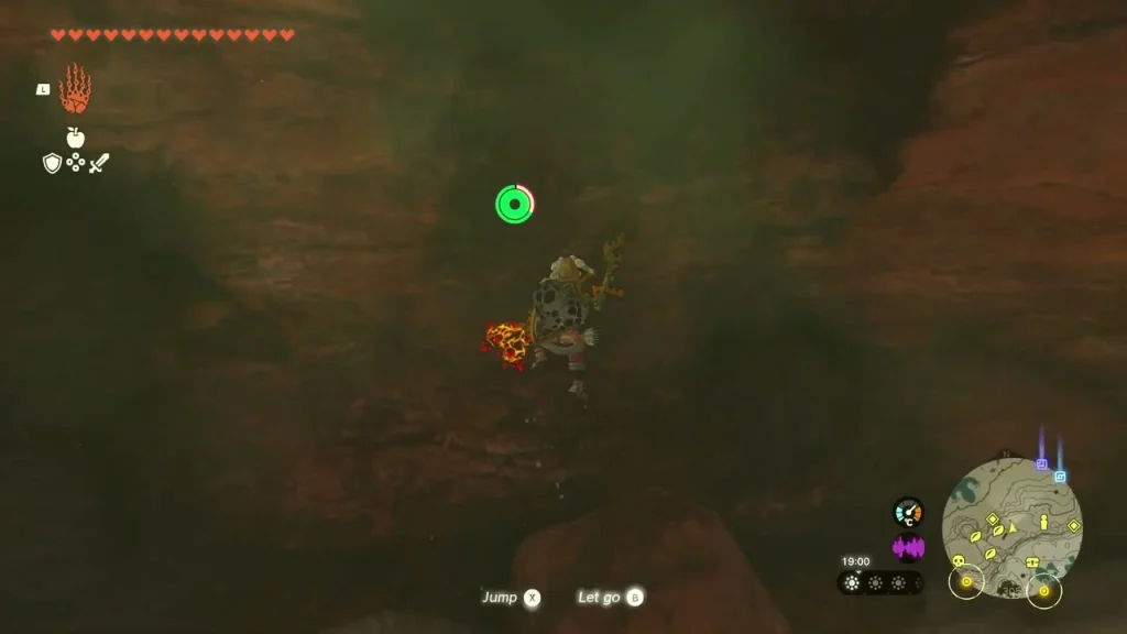 Rocky cave ledge with a green marker hovering above Rocky cave ledge with a green marker hovering above