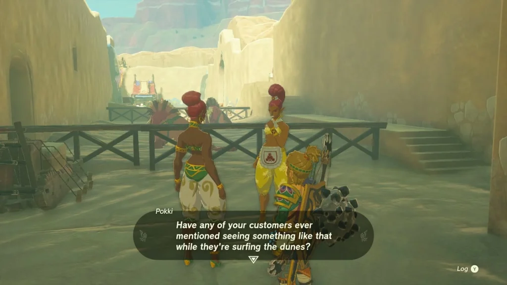Pokki talking beside a wooden fence in Gerudo Town