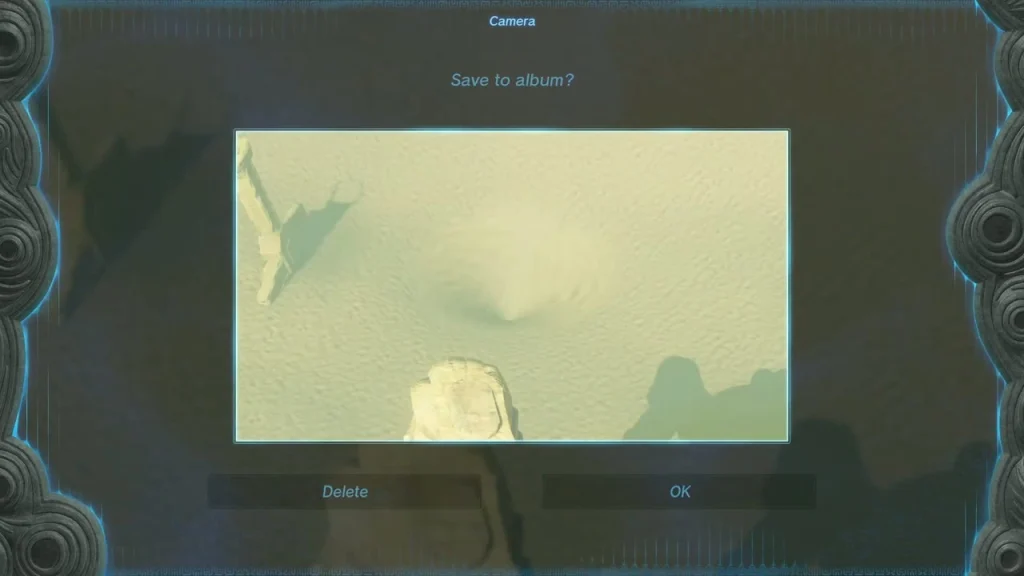 Save-to-album screen with the quicksand sinkhole picture