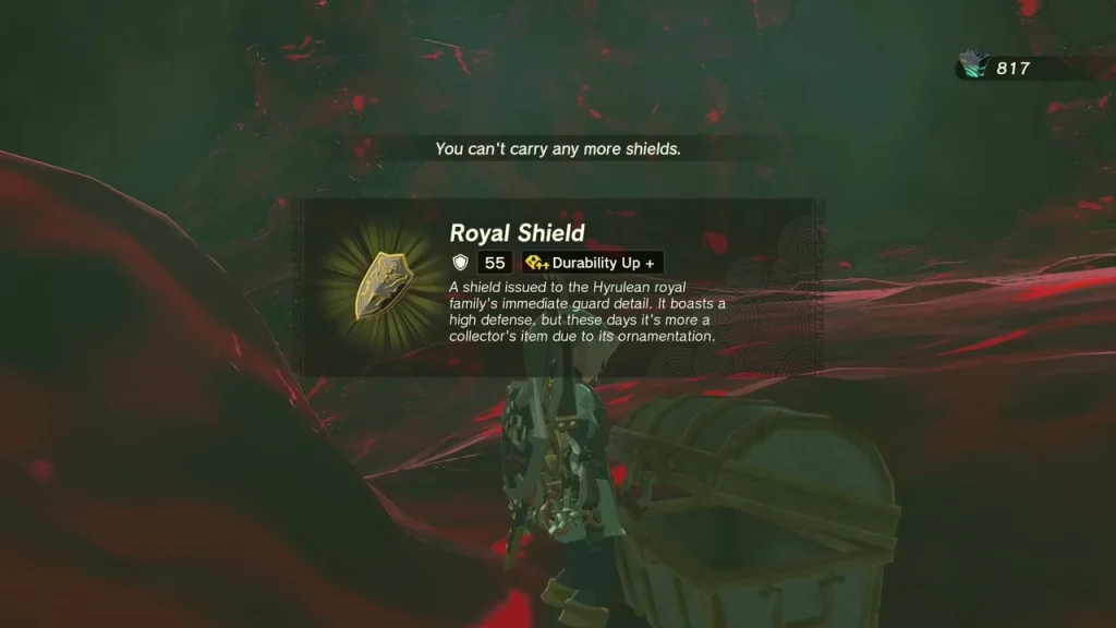 Royal Shield item box from a chest among red gloom roots Royal Shield item box from a chest among red gloom roots