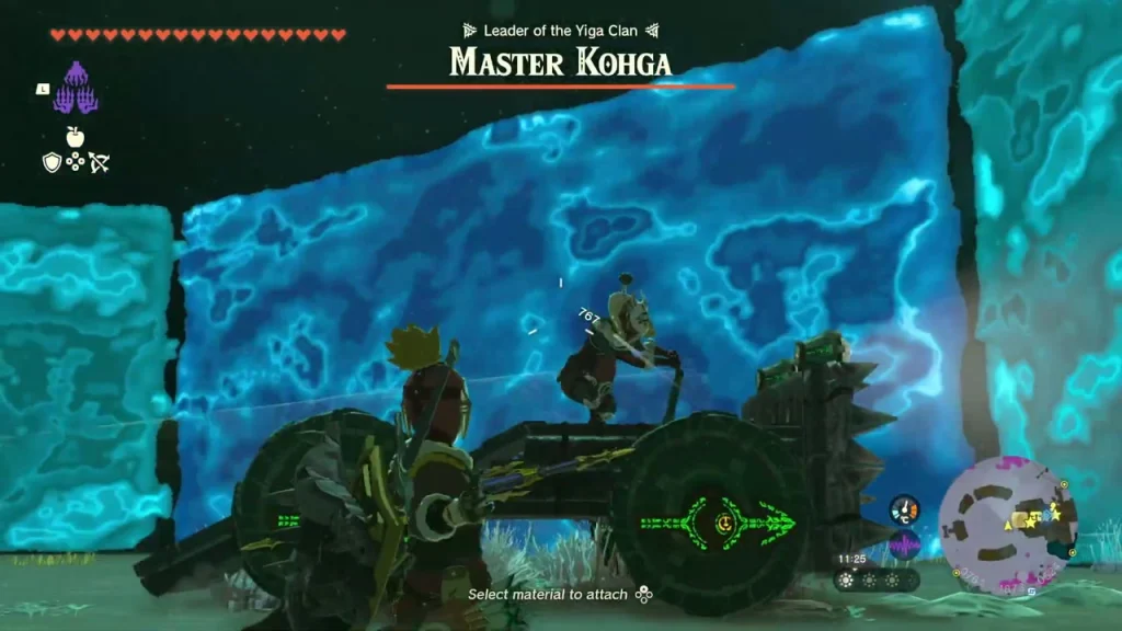 Master Kohga driving a spiked wheeled machine in front of blue energy walls Master Kohga driving a spiked wheeled machine in front of blue energy walls