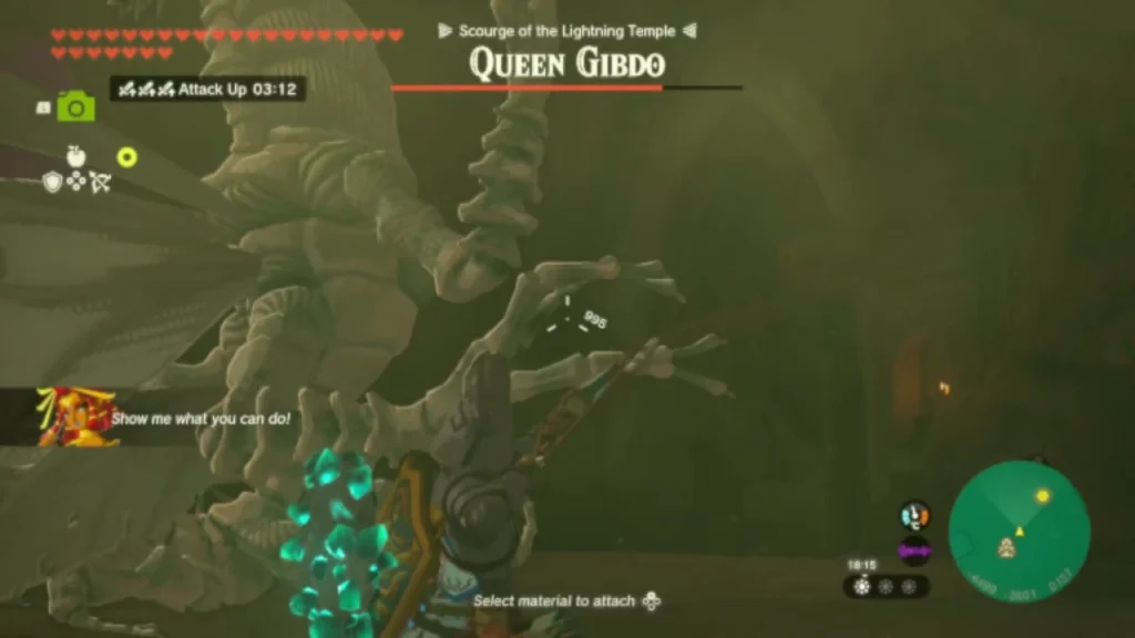 Queen Gibdo looming over the arena with the boss health bar and Attack Up buff active Queen Gibdo looming over the arena with the boss health bar and Attack Up buff active
