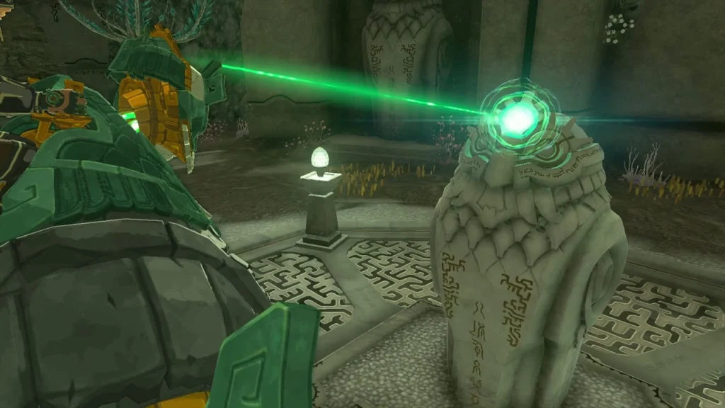 Owl statue with a green beam shining from the Construct's mask Owl statue with a green beam shining from the Construct's mask