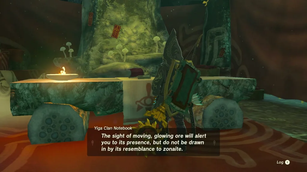 Candle-lit table with a Yiga Clan Notebook inside the hideout Candle-lit table with a Yiga Clan Notebook inside the hideout