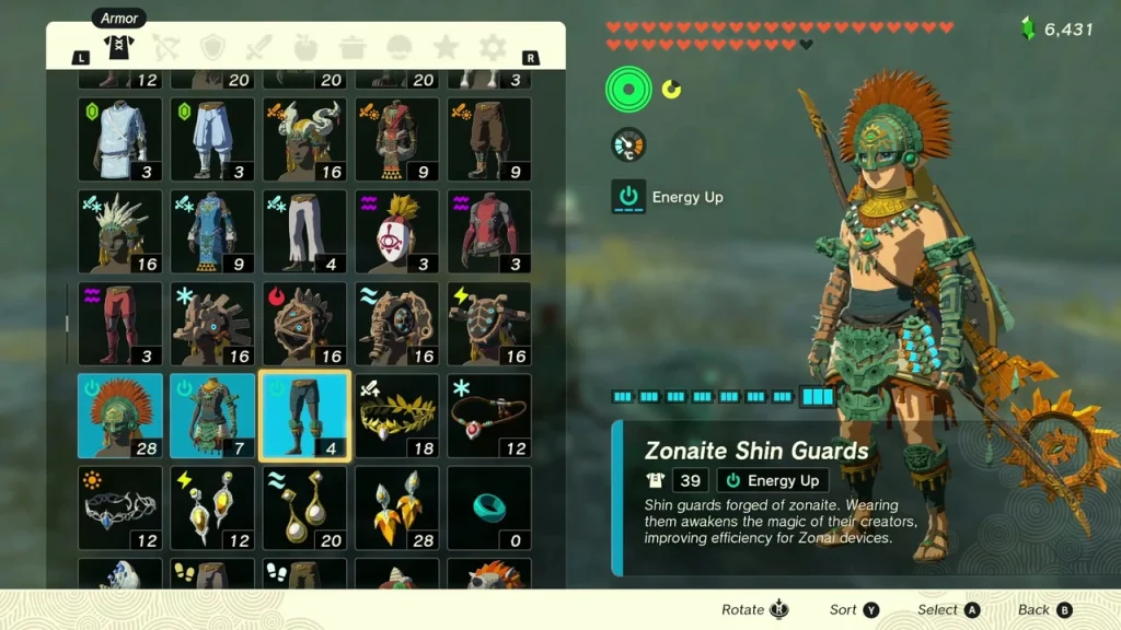 Armor menu showing Zonaite Shin Guards with their Energy Up bonus Armor menu showing Zonaite Shin Guards with their Energy Up bonus