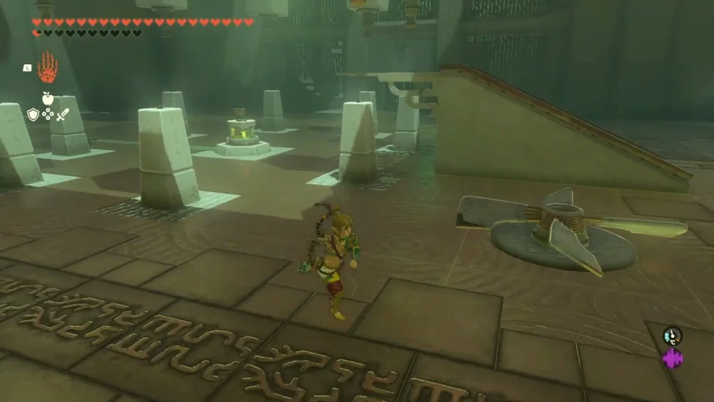 Entry chamber of Gemimik Shrine with stone pillars and a fan on the floor Entry chamber of Gemimik Shrine with stone pillars and a fan on the floor