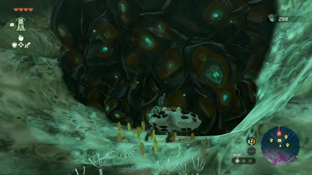 Dark Zonaite deposit with glowing green spots in a canyon wall Dark Zonaite deposit with glowing green spots in a canyon wall