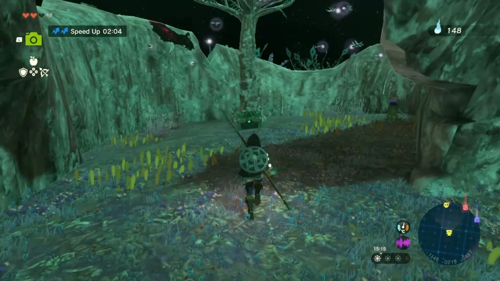 Low rock wall in Giant's Grove with a chest at its foot beside a gloom-covered tree Low rock wall in Giant's Grove with a chest at its foot beside a gloom-covered tree