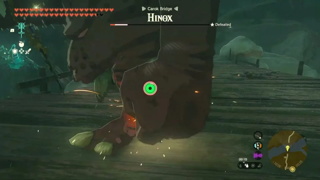 Hinox towering over a wooden bridge with its health bar shown Hinox towering over a wooden bridge with its health bar shown