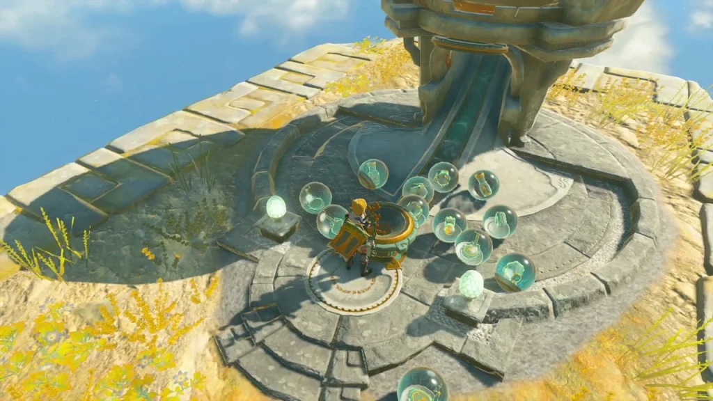 Zonai Device Dispenser pad under a stone pillar on the central island