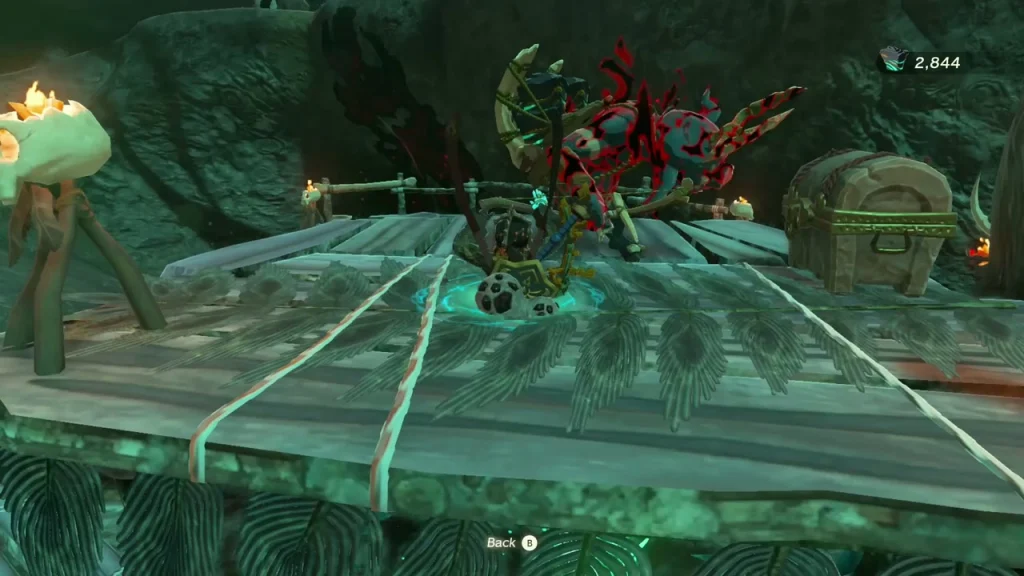 Chest on a plank platform inside a skull camp surrounded by gloom Chest on a plank platform inside a skull camp surrounded by gloom