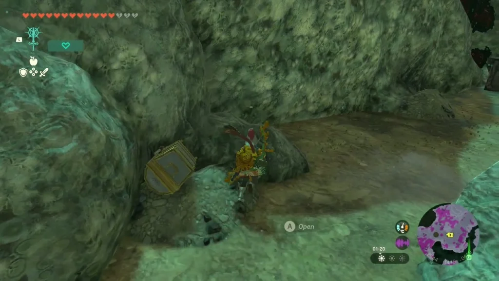 Chest tucked beside a boulder on a rocky slope in the Depths Chest tucked beside a boulder on a rocky slope in the Depths