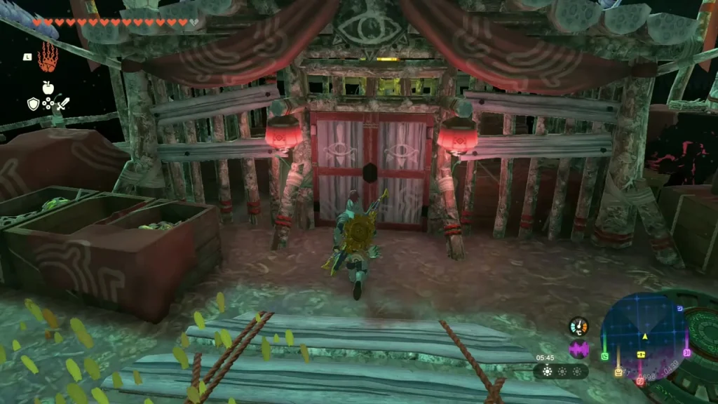 Yiga hideout building with red doors and curtains in the Depths Yiga hideout building with red doors and curtains in the Depths
