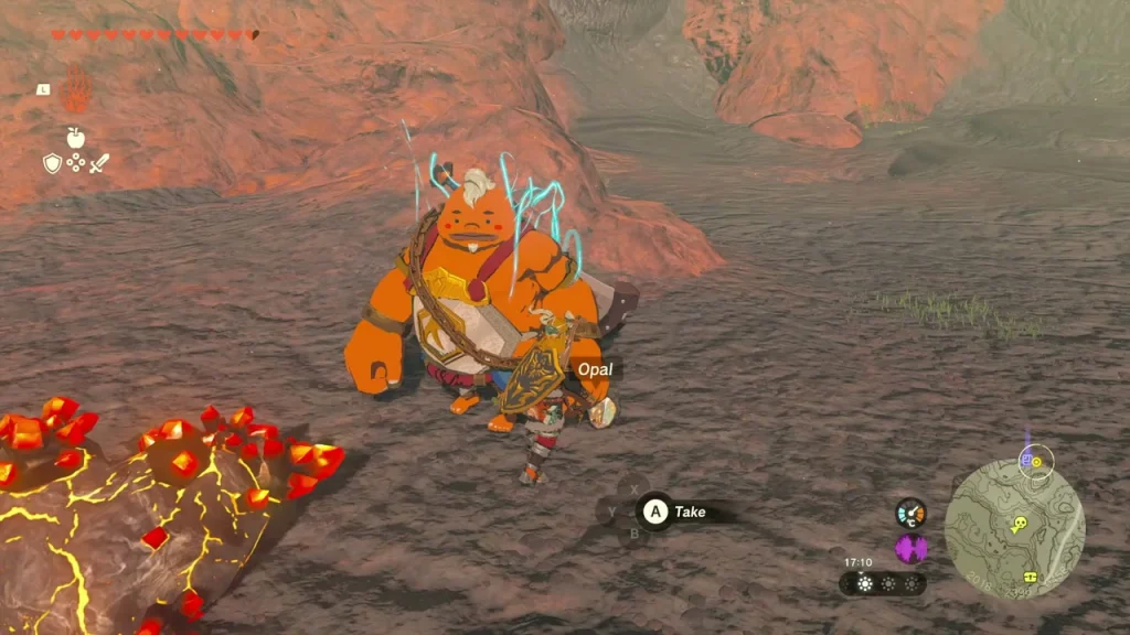 Opal dropped on the ground beside a defeated glowing rock giant Opal dropped on the ground beside a defeated glowing rock giant