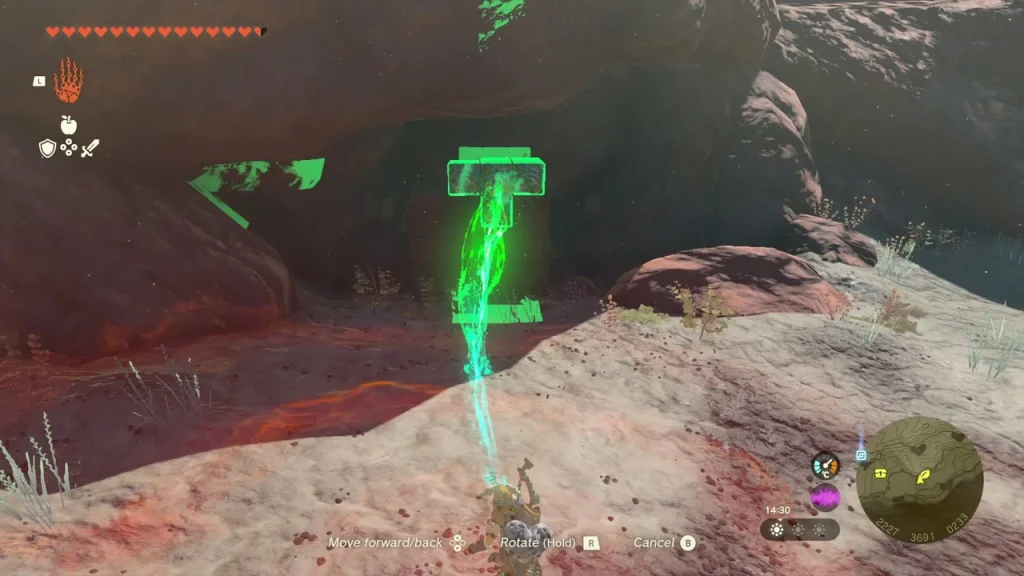 Stone block held on a green Ultrahand beam beneath a rock overhang Stone block held on a green Ultrahand beam beneath a rock overhang