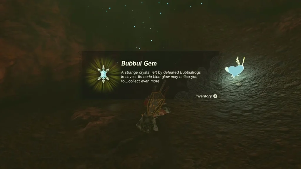 Bubbul Gem item box beside a pale Bubbulfrog in the dark den Bubbul Gem item box beside a pale Bubbulfrog in the dark den