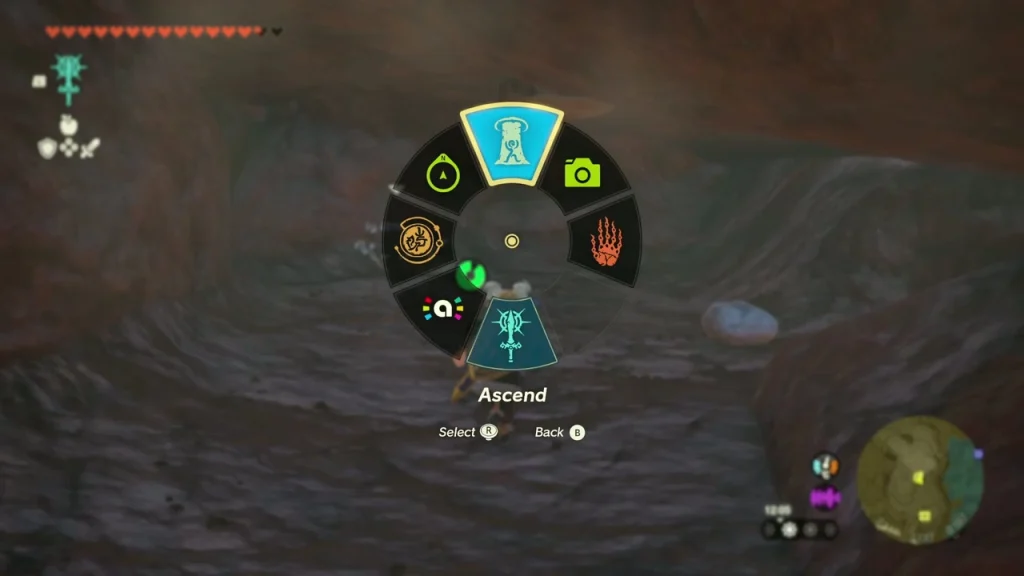 Ascend highlighted on the radial menu under a rock overhang for the marker Korok Ascend highlighted on the radial menu under a rock overhang for the marker Korok