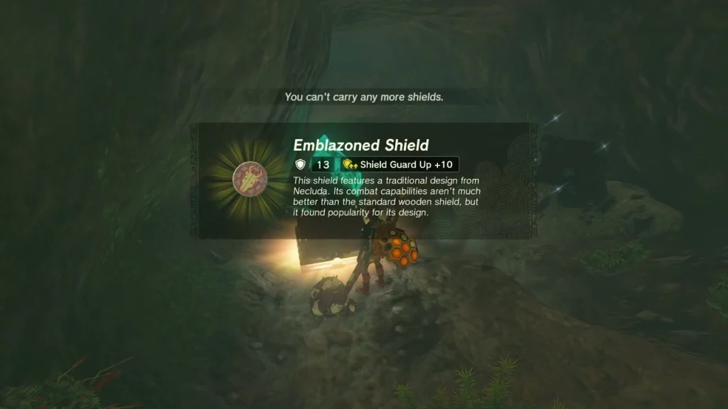 Emblazoned Shield item box from a cave chest Emblazoned Shield item box from a cave chest