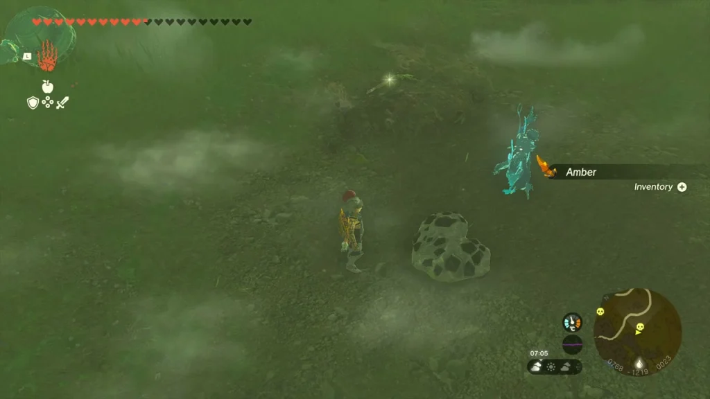 Amber item dropped on the grass beside the broken Talus Amber item dropped on the grass beside the broken Talus
