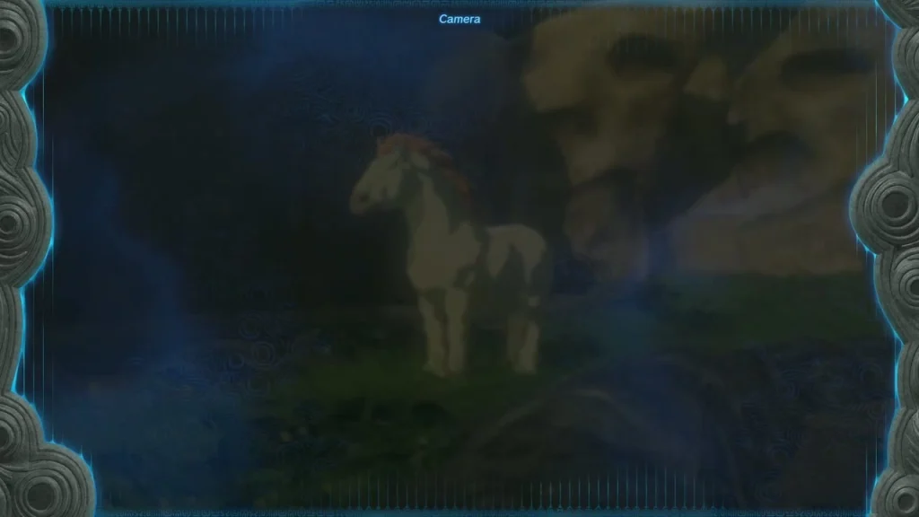 Camera view of the giant white stallion on a mountain ledge Camera view of the giant white stallion on a mountain ledge