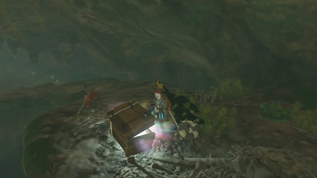 Chest glowing open on a rock shelf in the deep part of the well Chest glowing open on a rock shelf in the deep part of the well