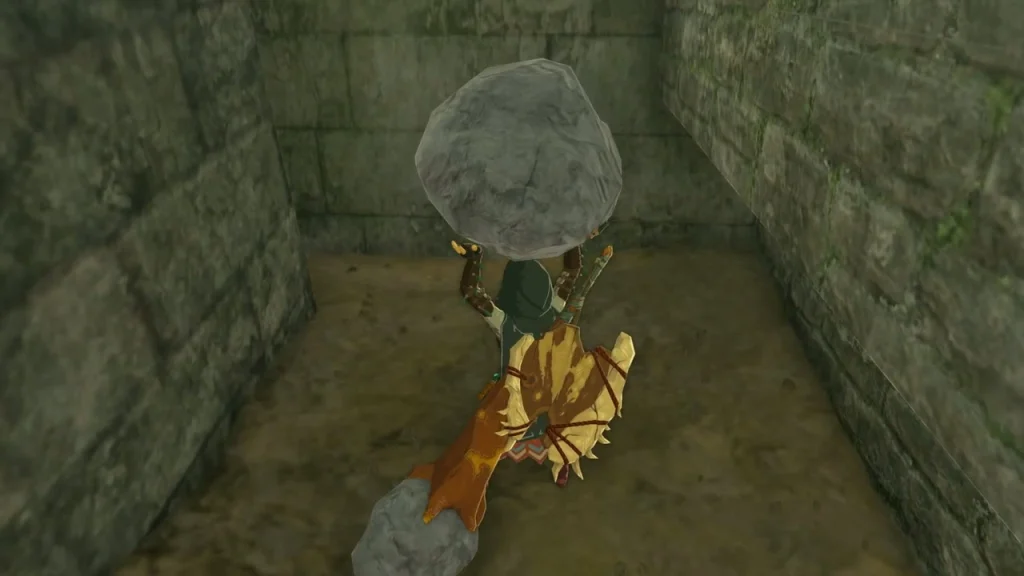Large rock lifted overhead in the dirt-floored stone trench Large rock lifted overhead in the dirt-floored stone trench
