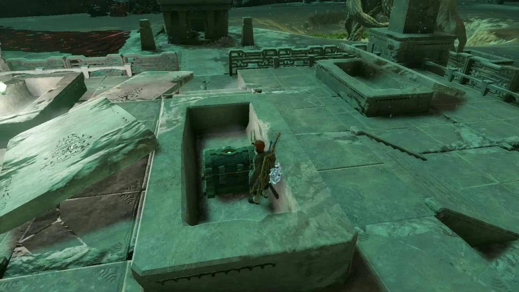 Chest sitting in a low sunken tomb in the stone ruin Chest sitting in a low sunken tomb in the stone ruin