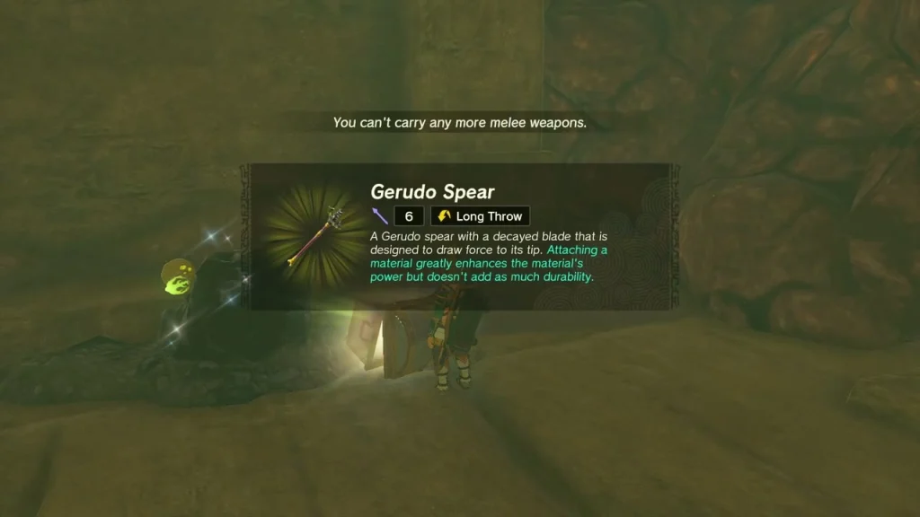 Gerudo Spear item box above a chest in a dark ruin passage Gerudo Spear item box above a chest in a dark ruin passage