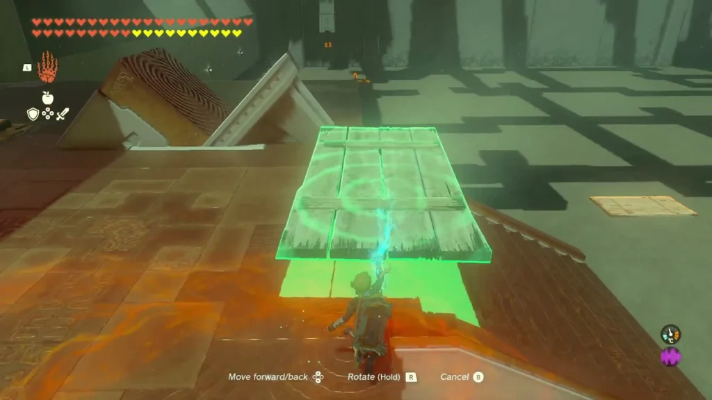 Plank being set as a ramp over a lava-red floor and sand strip Plank being set as a ramp over a lava-red floor and sand strip