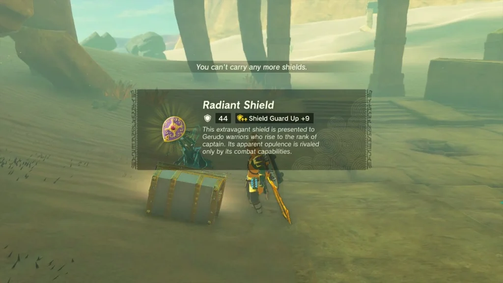 Radiant Shield item box next to a chest under a stone arch Radiant Shield item box next to a chest under a stone arch
