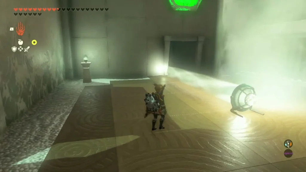 Beam of sunlight reflected across a Rakashog Shrine room toward a doorway Beam of sunlight reflected across a Rakashog Shrine room toward a doorway