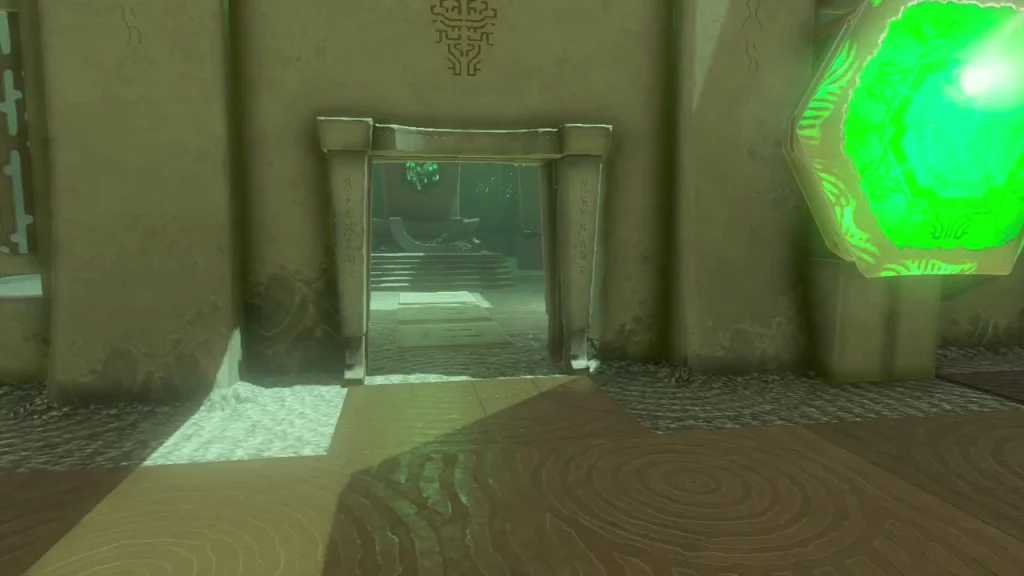 Open doorway beside a green glowing gem in Rakashog Shrine Open doorway beside a green glowing gem in Rakashog Shrine