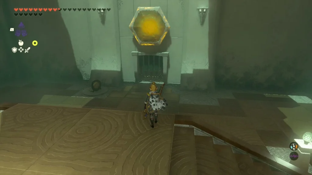 Rakashog Shrine entry room with a sunlit gate and a yellow gem above the barred door Rakashog Shrine entry room with a sunlit gate and a yellow gem above the barred door