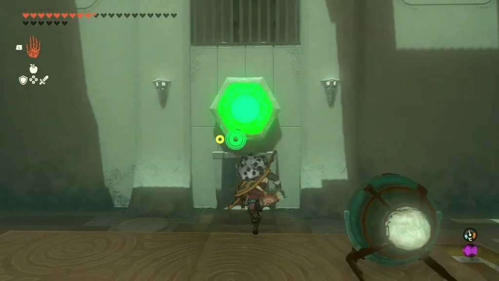 Mirror orb beside the first gate with the gem above it glowing green Mirror orb beside the first gate with the gem above it glowing green