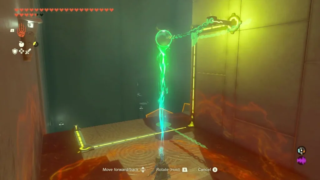 Metal ball on a chain being swung with Ultrahand beside an electric rail Metal ball on a chain being swung with Ultrahand beside an electric rail