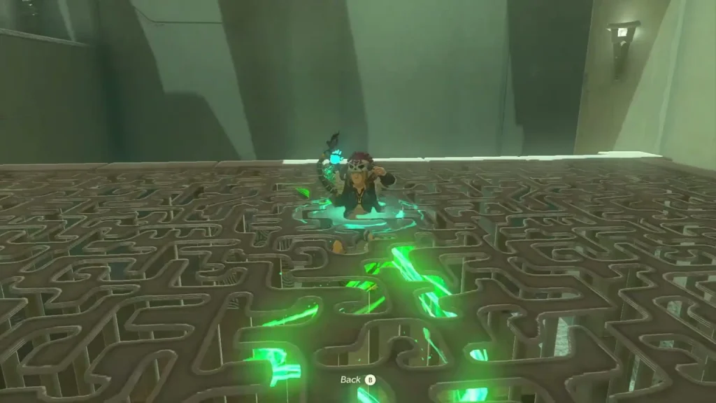 Maze-patterned shrine floor seen from above with green glowing trails Maze-patterned shrine floor seen from above with green glowing trails
