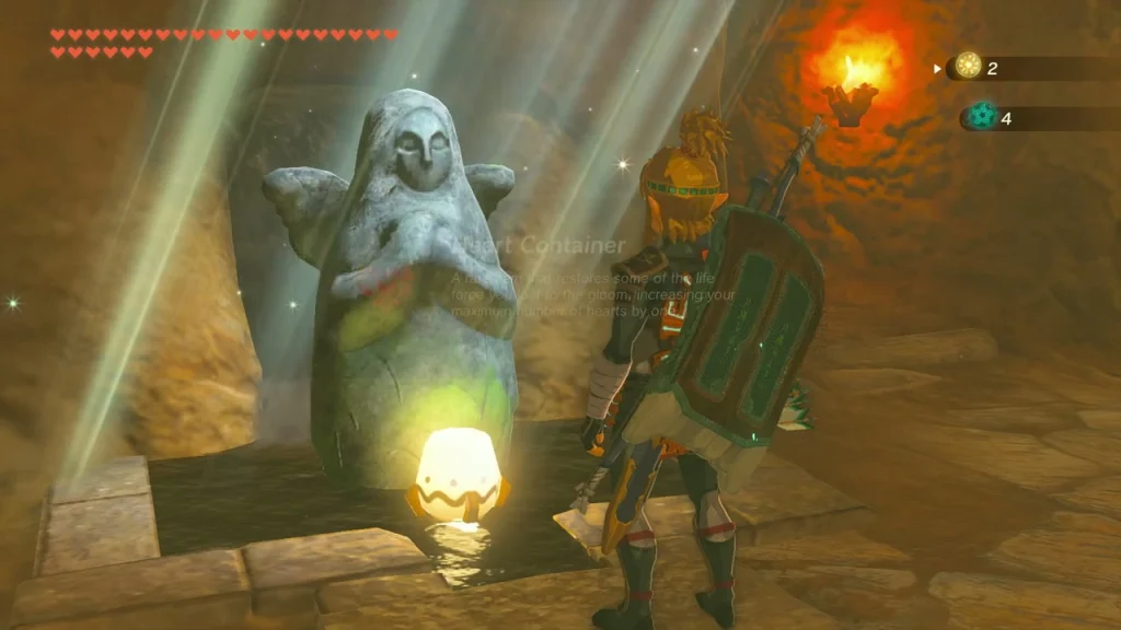 Heart Container card rising from the Goddess statue