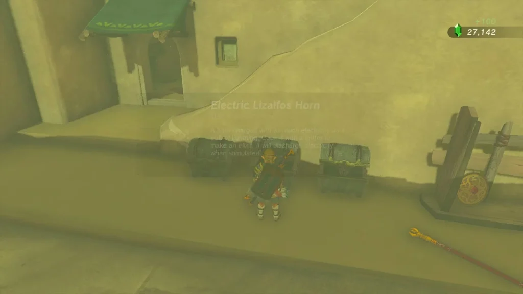 Pair of treasure chests beside a market gate