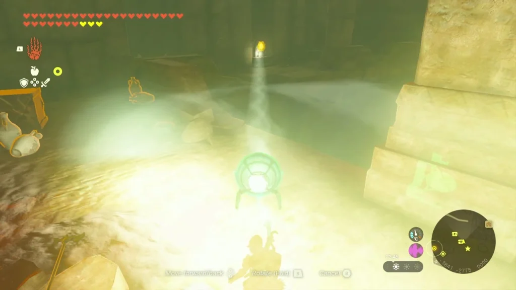 Beam of light shining across a room of the Valley of Silent Statues