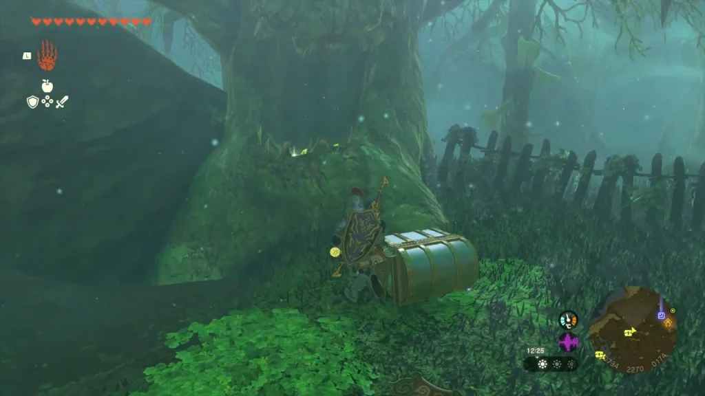 Wooden chest at the base of a huge swamp tree beside a wooden fence in Mido Swamp fog
