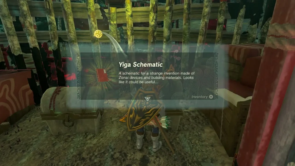 Yiga Schematic item box over a chest inside a red-and-white Yiga hideout camp in the Depths
