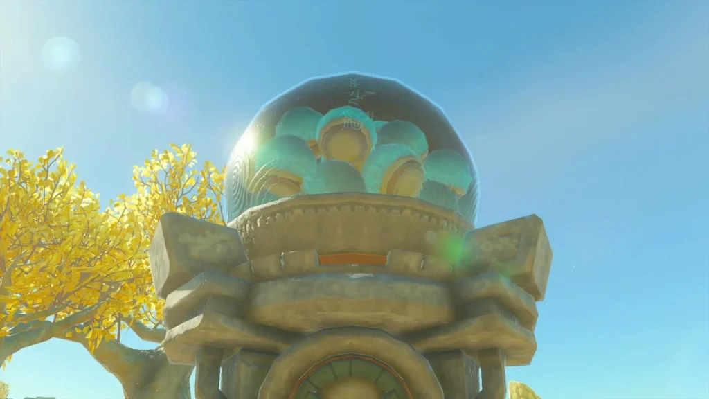 Dome-topped device dispenser seen from below beside a yellow tree Dome-topped device dispenser seen from below beside a yellow tree