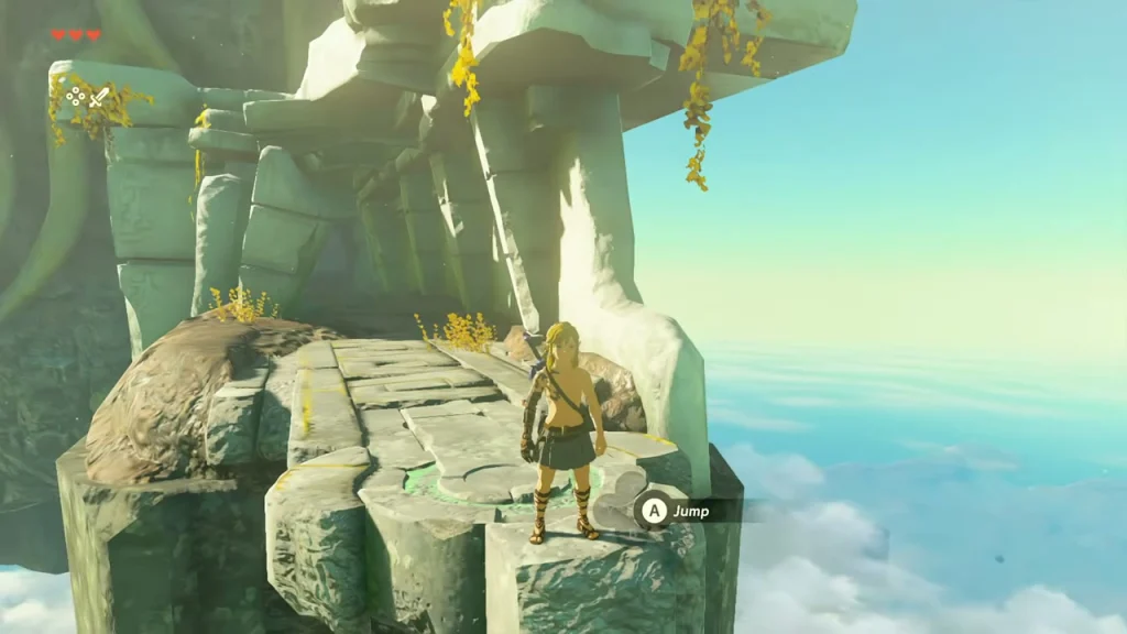 Stone ledge with a Jump prompt at the edge of the Room of Awakening exit above the clouds Stone ledge with a Jump prompt at the edge of the Room of Awakening exit above the clouds