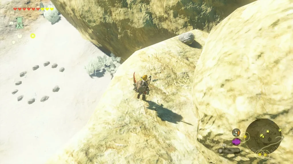 Ring of red stones with a Korok in the middle on a snowy ridge Ring of red stones with a Korok in the middle on a snowy ridge